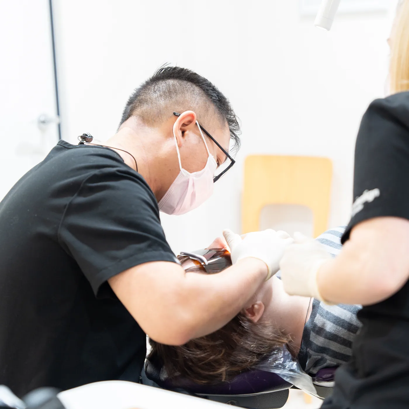 A confident patient after treatment at Medland Orthodontics