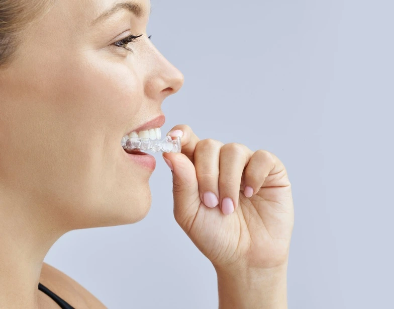 Specialist Orthodontist comparing discreet treatment options Specialist Orthodontist comparing discreet treatment options