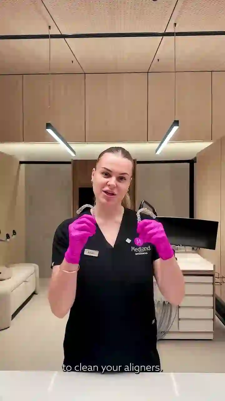 Demonstration of how to clean Invisalign aligners