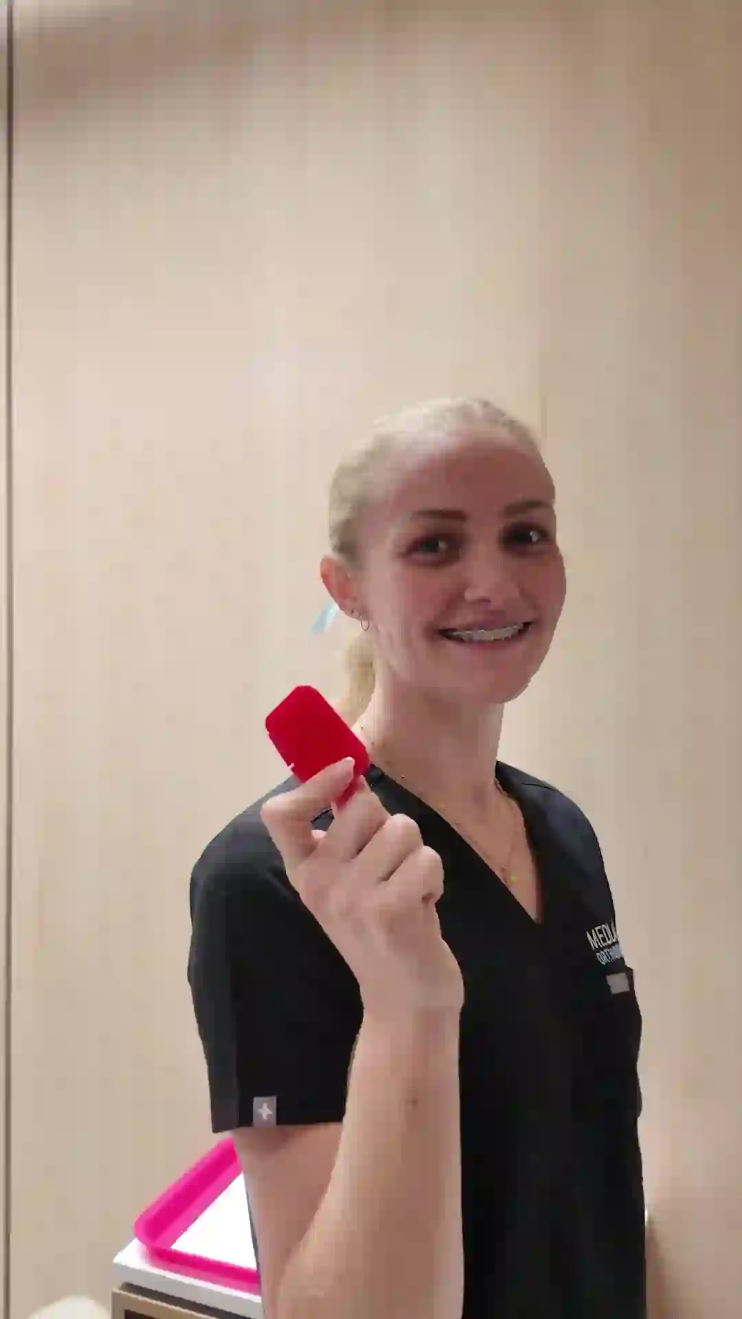 Demonstration of applying orthodontic wax to braces